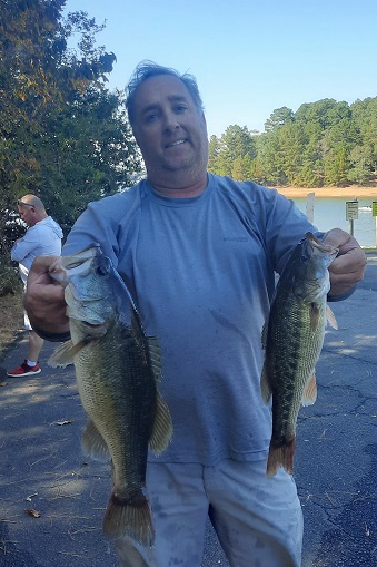 3rd & BIG BASS - Swez with 10.57 & 4.15 lbs.jpg