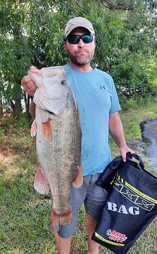 2nd Place & BIG BASS - Saunders & Hyder with 14.91 & 8.11 lb HOG.jpg